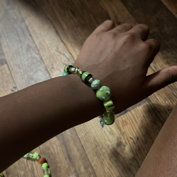 These two green bracelets are a bundle u can get. - Picture 3 of 4
